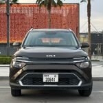 Rent Kia Carens 2023 in Al Karama