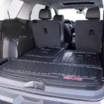 GMC Acadia 2023 with driver