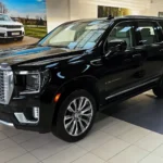 GMC Yukon Denali 2024 with driver