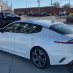 Kia Stinger 2021 with driver